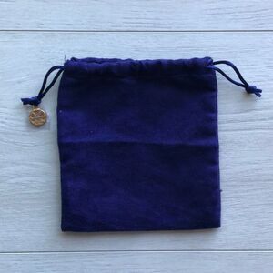 Tory Burch jewelry pouch with charm